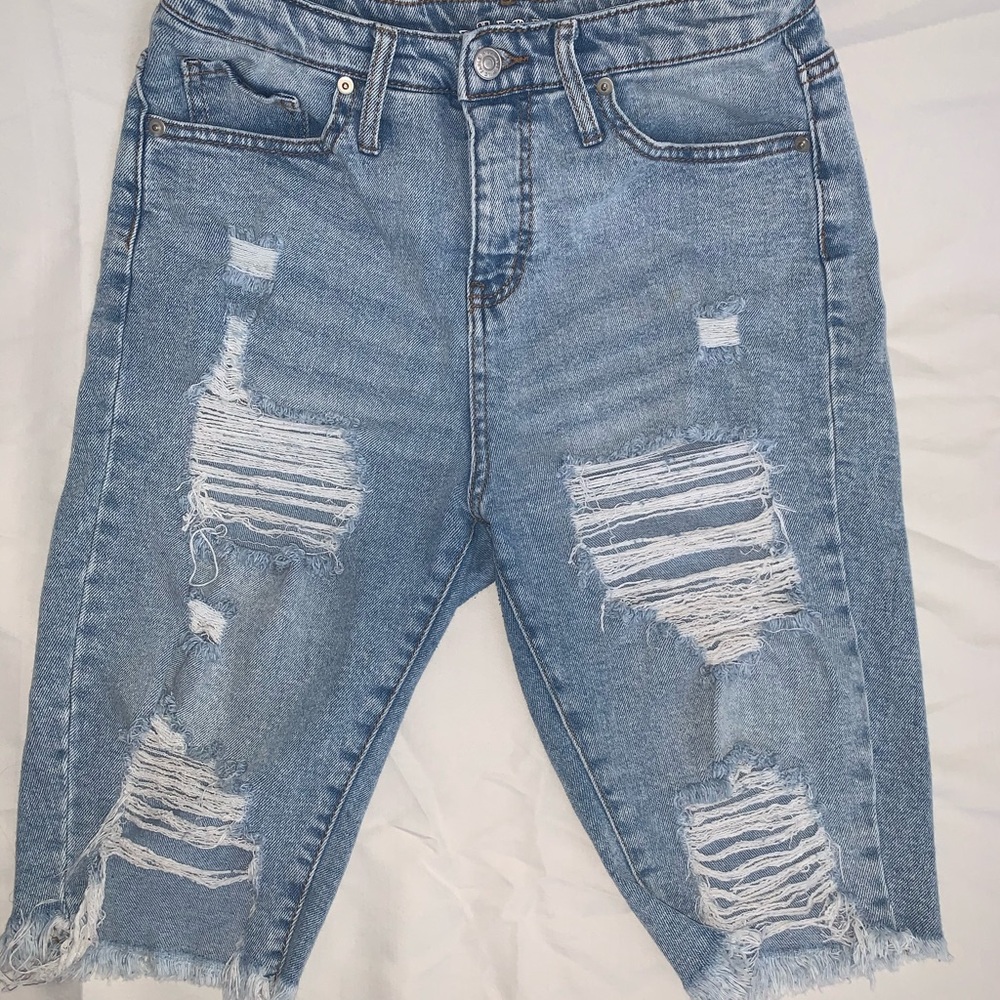 Women’s distressed longline jean shorts